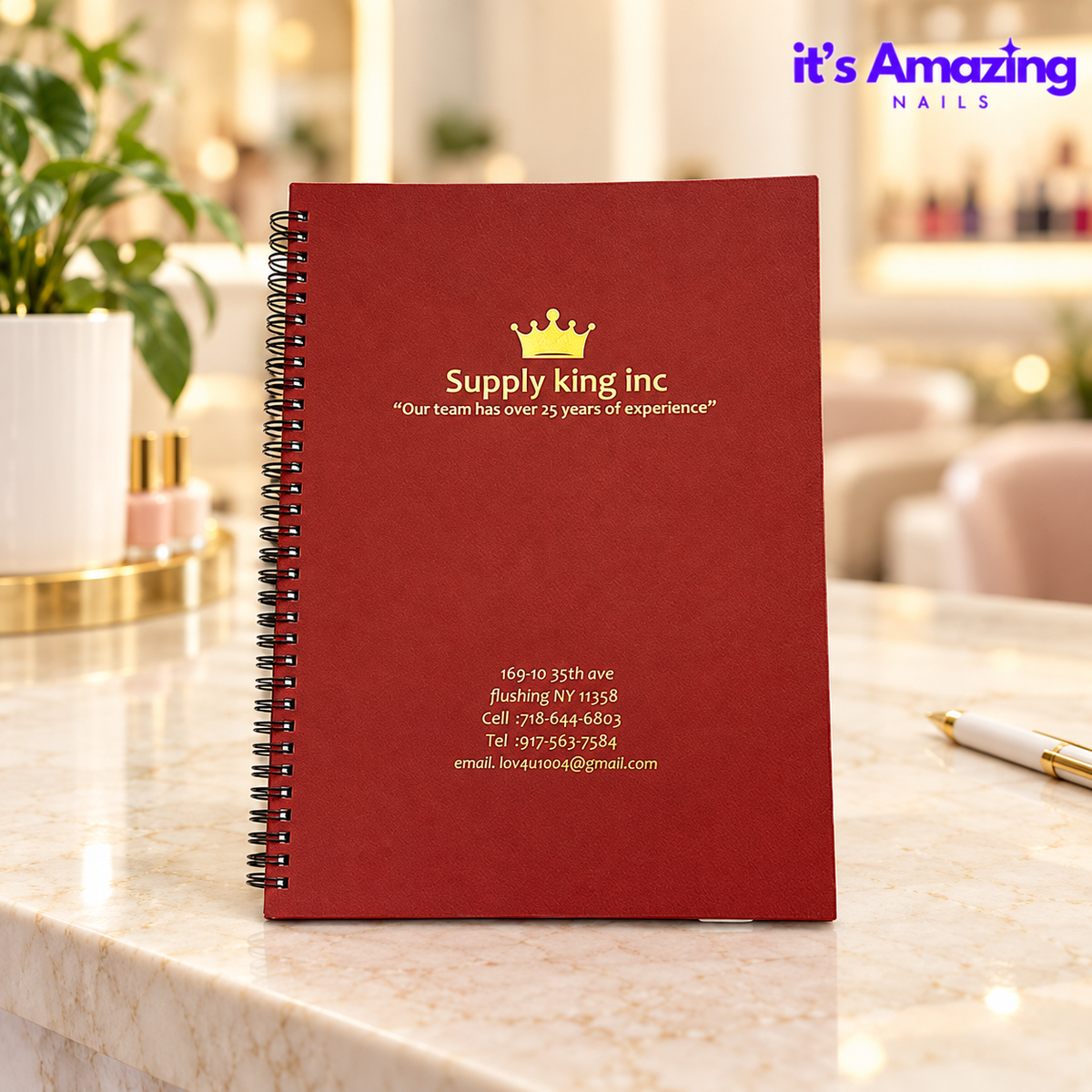 Red-brown spiral appointment book on an ivory salon reception desk