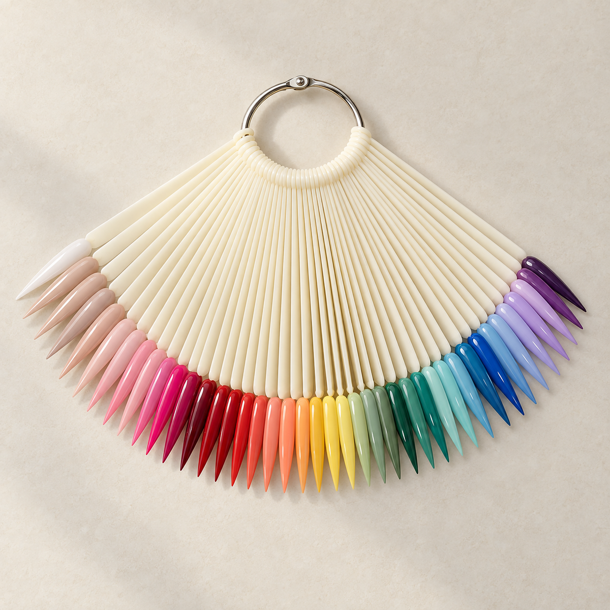 Illustrative use: painted stiletto color swatches on a ring; supplied unpainted